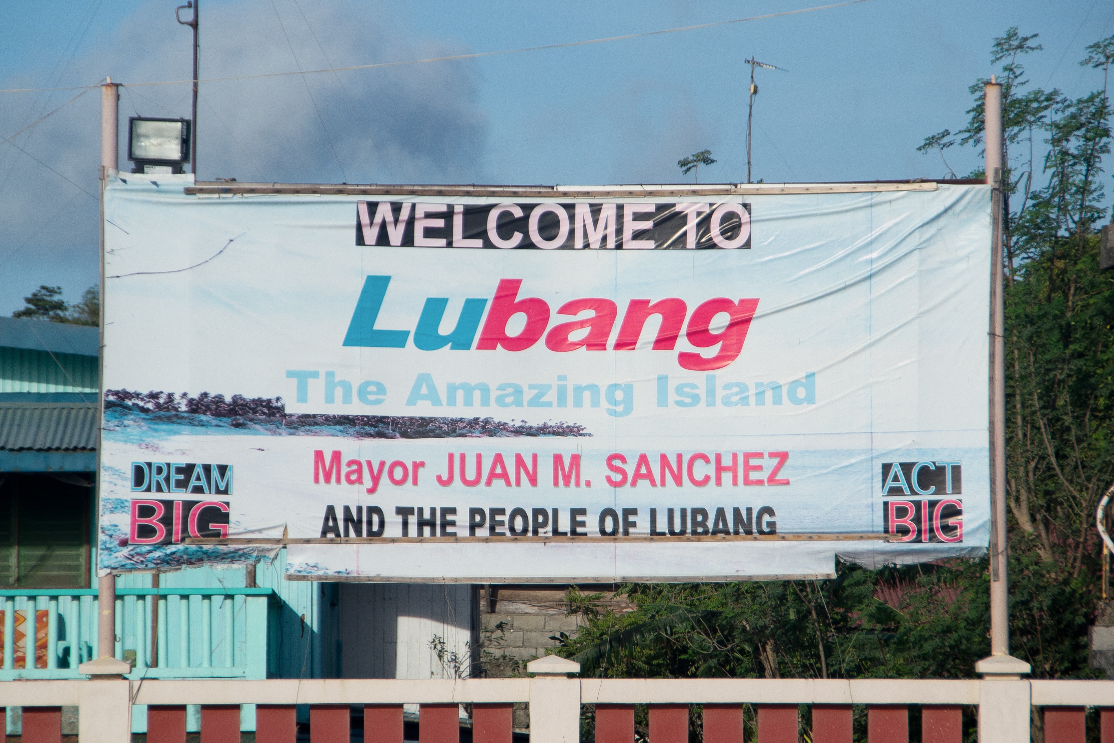 A welcome sign in Port of Tilik